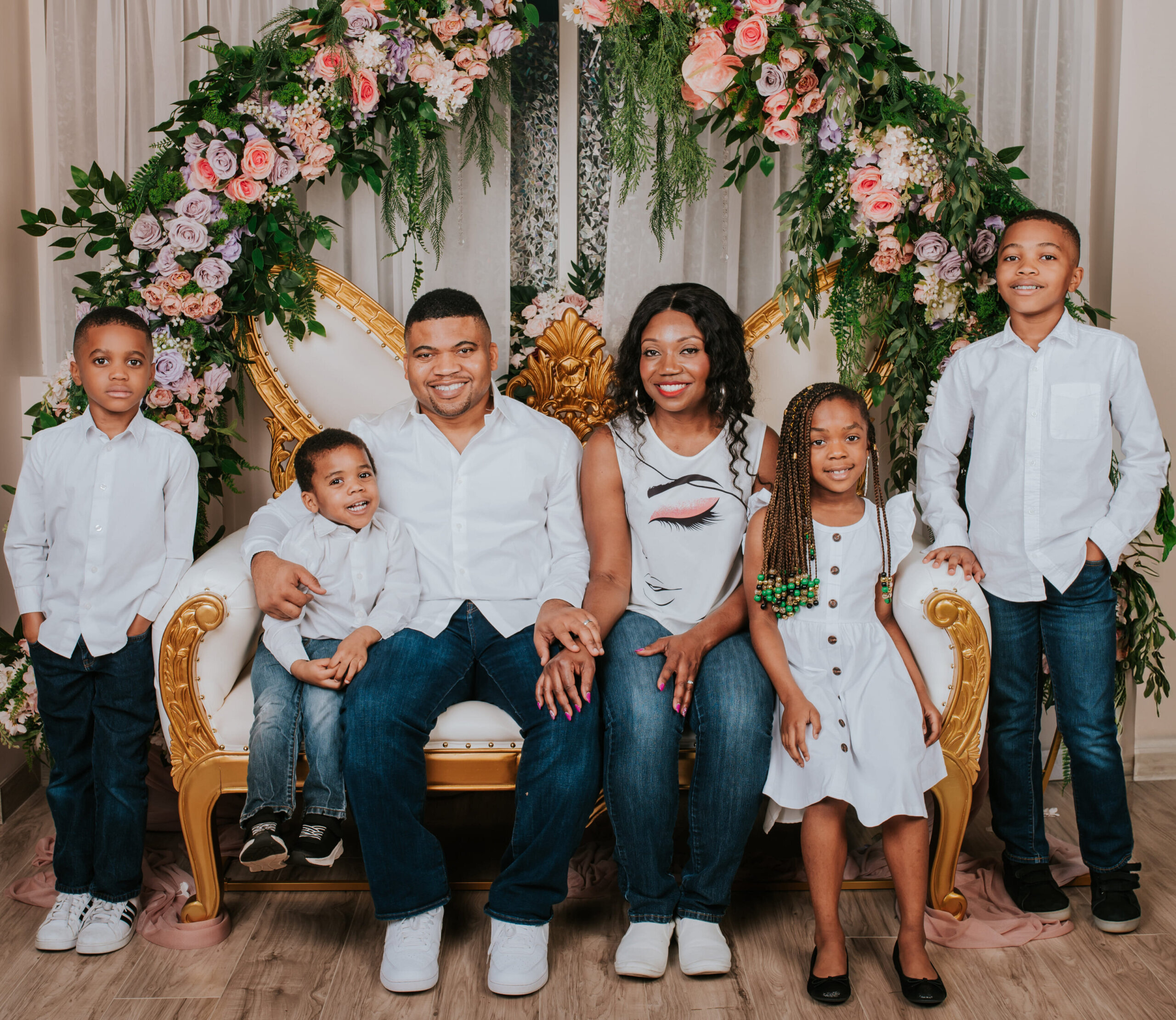 Franchise owners, Chuck and Chichi Ejim with their children